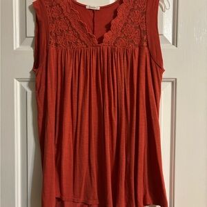 Maurices Sleeveless Lace Blouses. Sleeveless: one orange and one black.